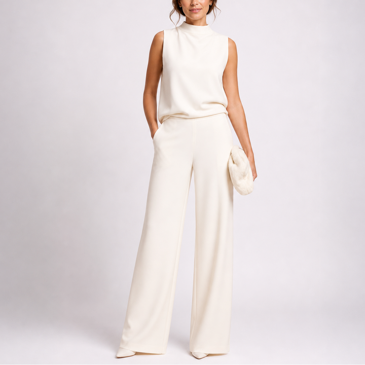 Chic women's sleeveless mock neck jumpsuit, elegant for formal events like parties & weddings.