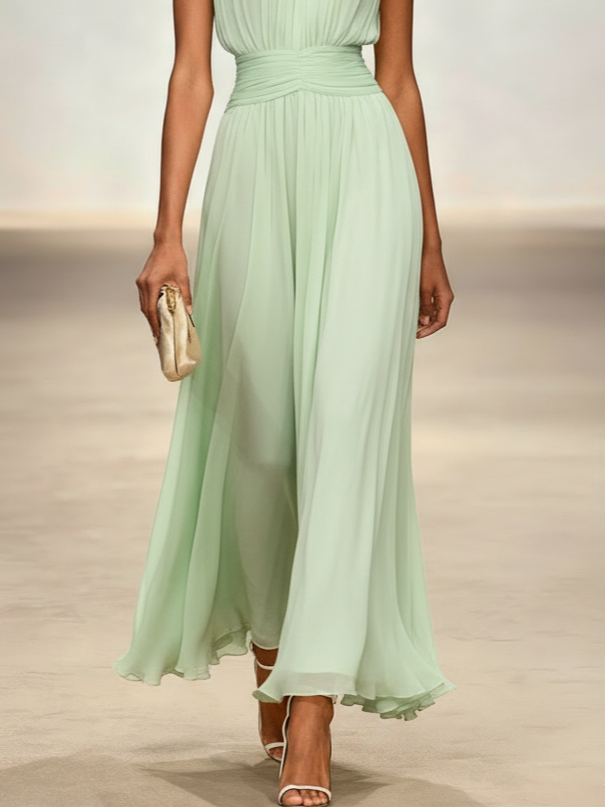 Photogenic sleeveless ruched A-line maxi dress, perfect for memorable wedding events.