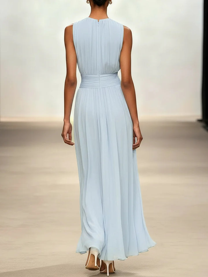 Elegant wedding guest maxi dress, sleeveless with a flattering ruched A-line silhouette.