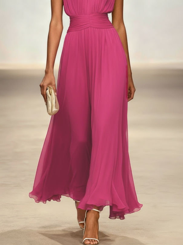 Make a statement in this sleeveless ruched A-line maxi wedding guest dress.