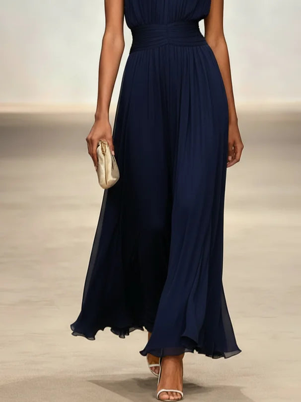 Timeless sleeveless ruched A-line maxi dress for enduring style at weddings & parties.
