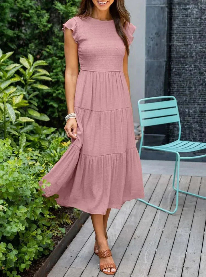 Effortless women's midi dress with smocked detail, sleeveless for ultimate summer comfort.