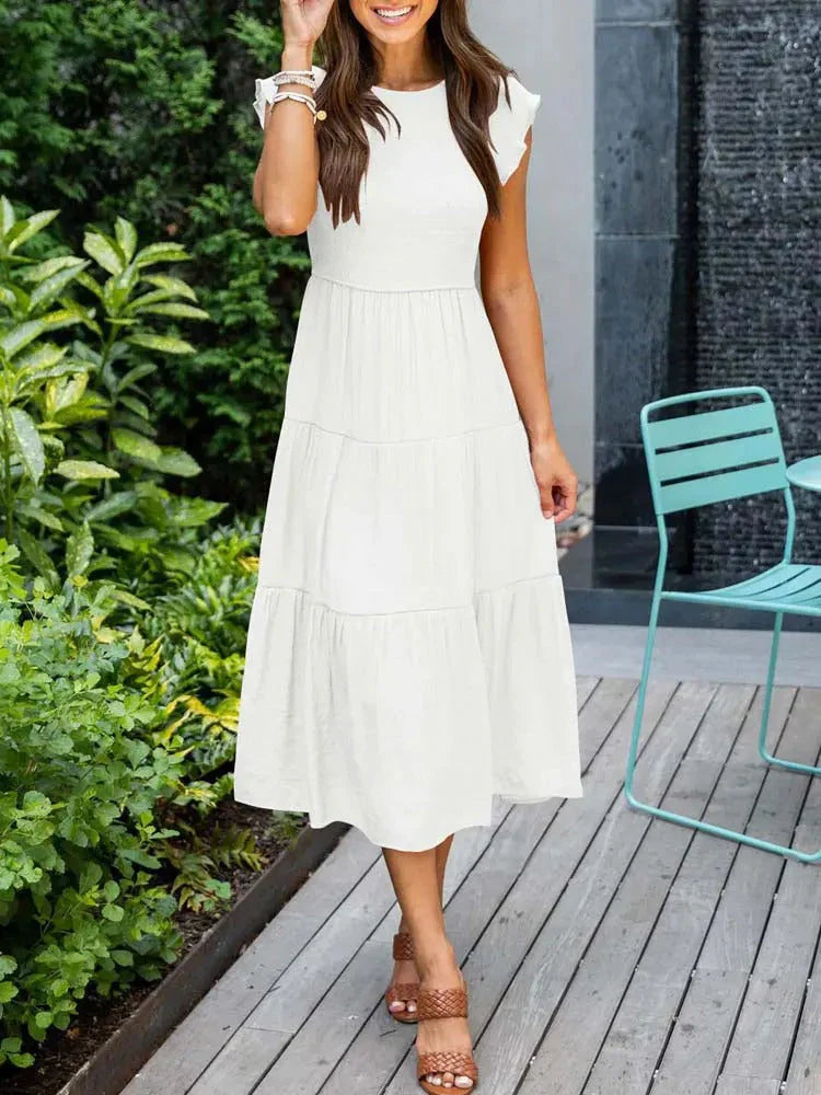 Stylish women's A-line smocked midi dress, a perfect casual summer staple.