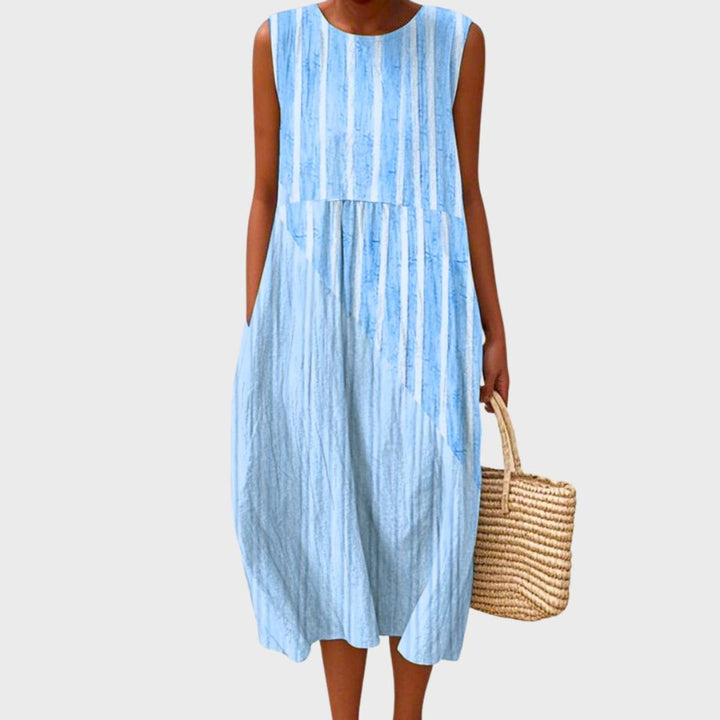 Women's casual sleeveless tiered plaid midi dress, great for summer fashion & holiday wear.