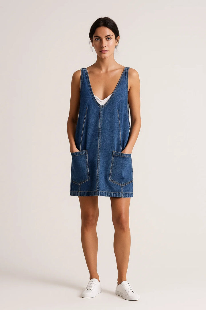 Comfortable women's V-neck sleeveless denim mini dress. Stylish everyday wear, ideal for warm weather.