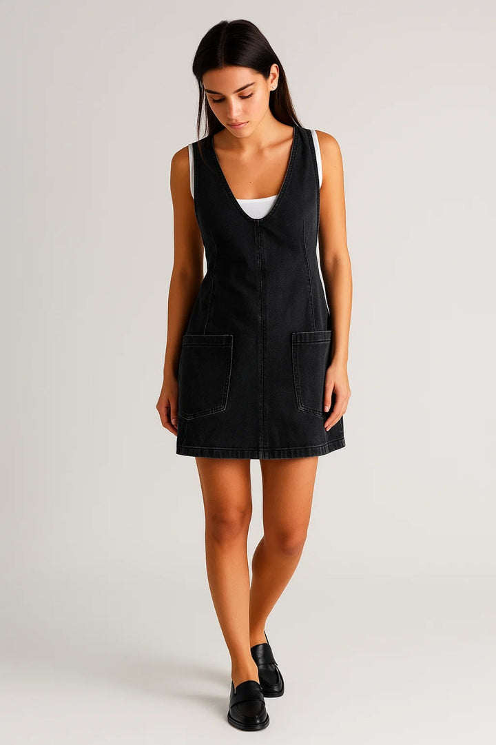 Stylish women's sleeveless V-neck denim mini dress. Chic and comfortable for casual spring, summer, and fall fashion.