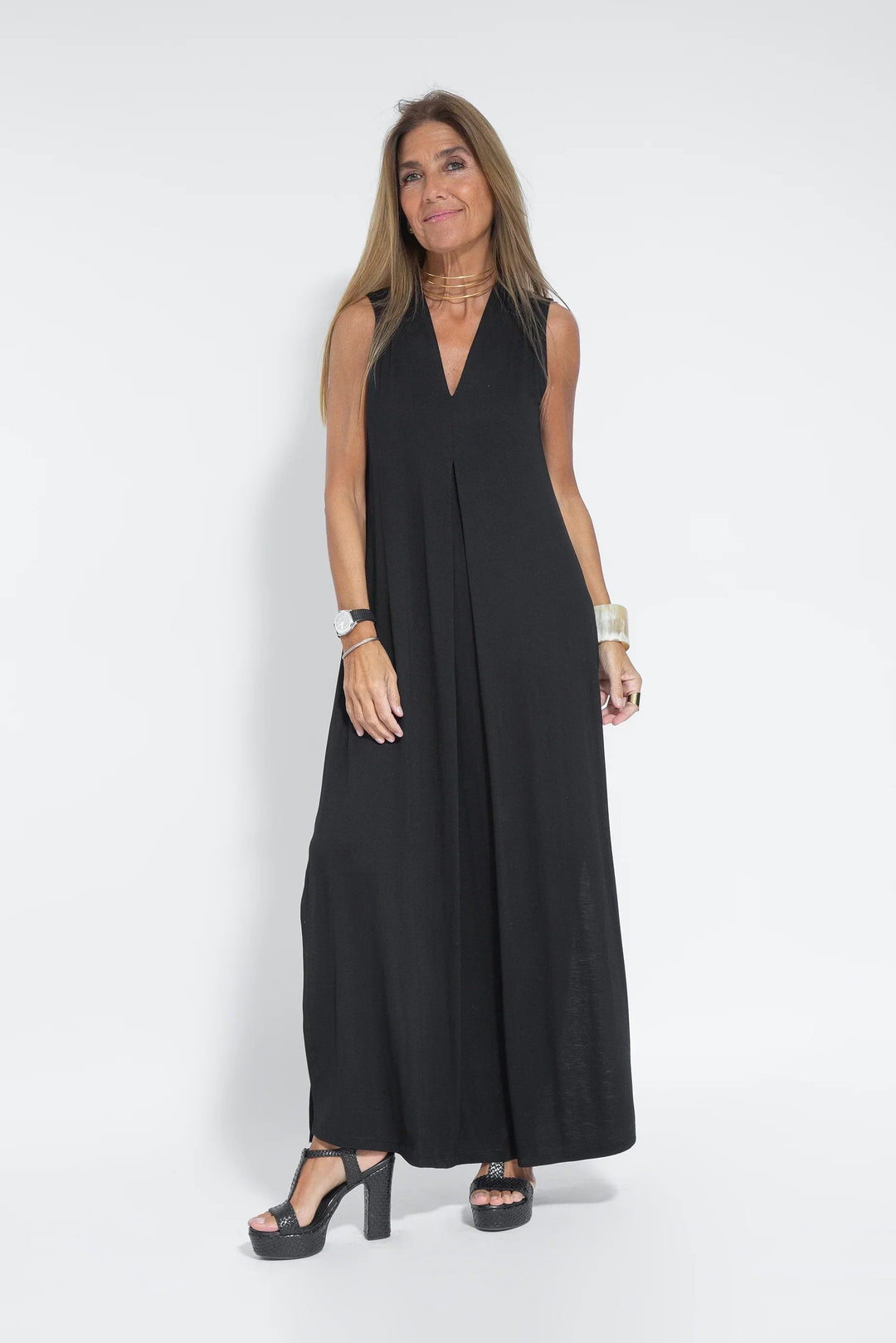 Women's sleeveless V-neck flowing maxi evening dress for formal events.
