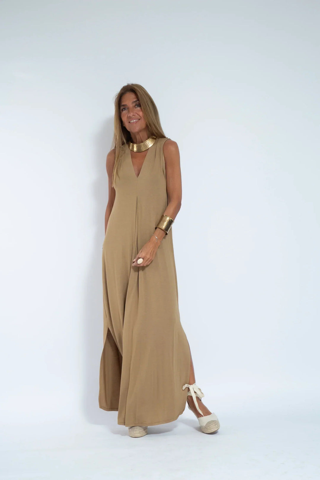 Graceful V-neck sleeveless maxi evening dress for women, with a beautiful flowing silhouette.