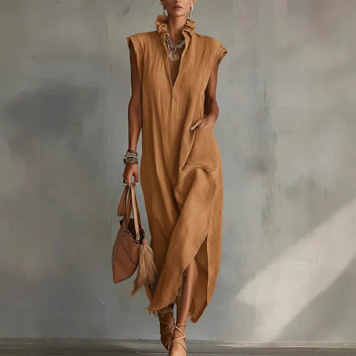 Relaxed fit women's sleeveless midi shirt dress, comfortable and flowing fabric, ideal for summer casual style.
