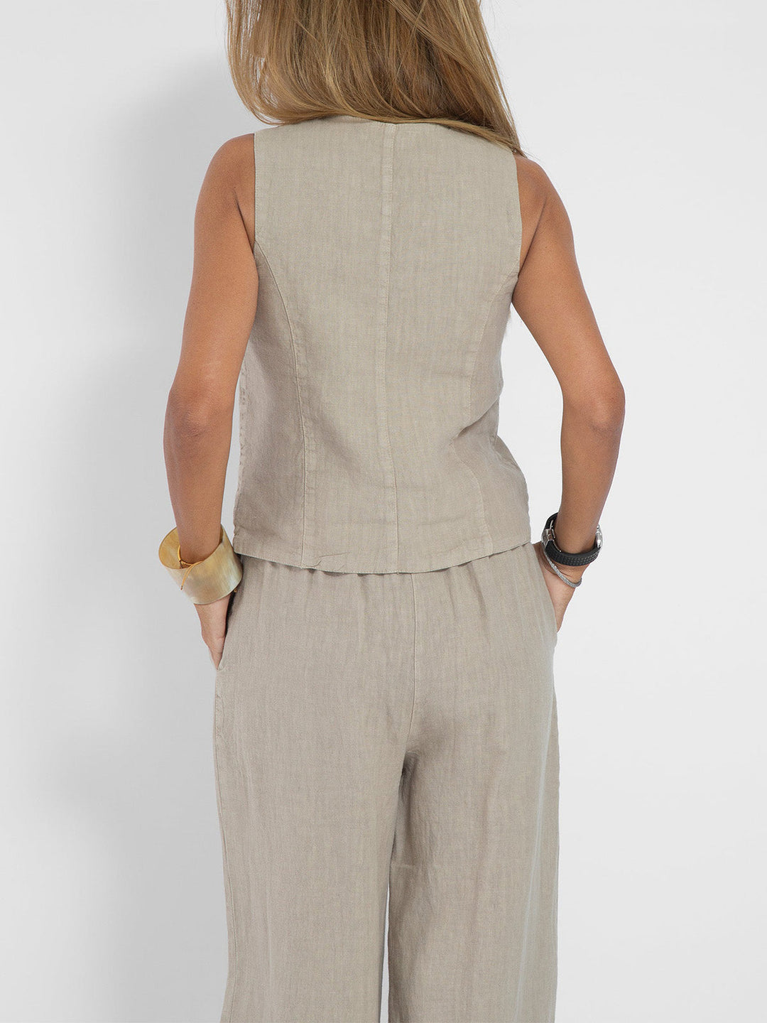 Womens casual chic set: a comfortable sleeveless V-neck top & stylish wide-leg trousers.