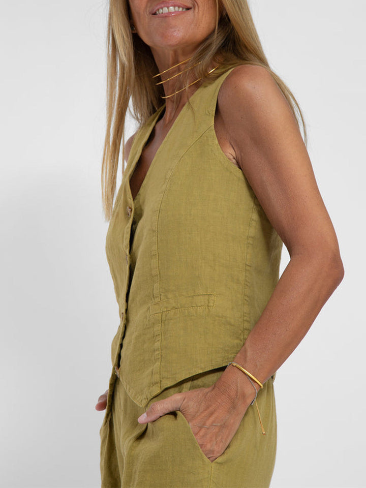 Formal wear women's set with a sophisticated V-neck top & comfortable wide-leg trousers.
