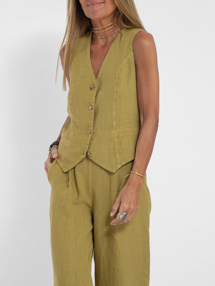 Stylish women's sleeveless V-neck top & wide-leg trouser set for a chic, tailored look.