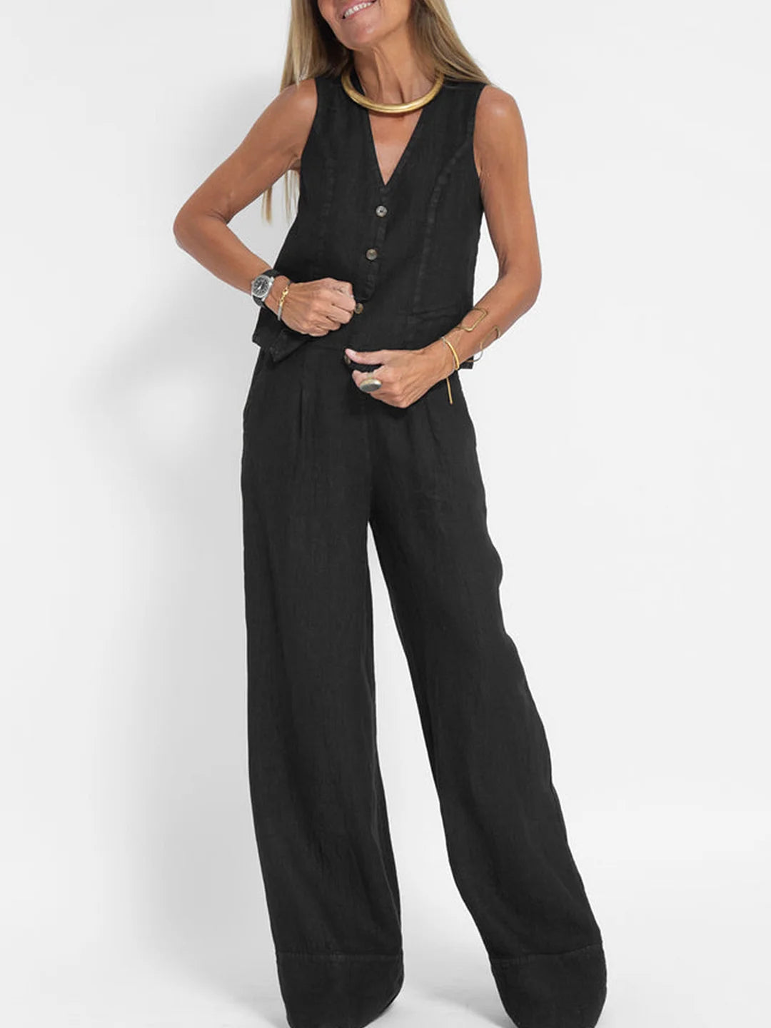 Sophisticated women's elegant set: sleeveless V-neck top & flowing wide-leg trousers.