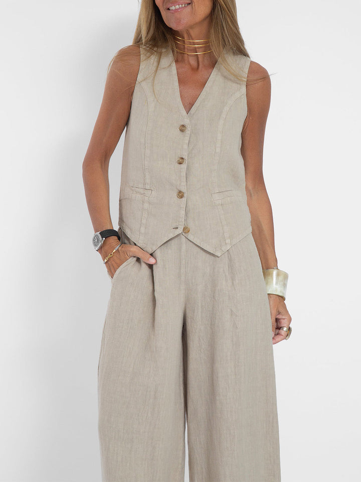 Tailored women's matching set, a sleeveless V-neck top and flattering wide-leg pants for any occasion.