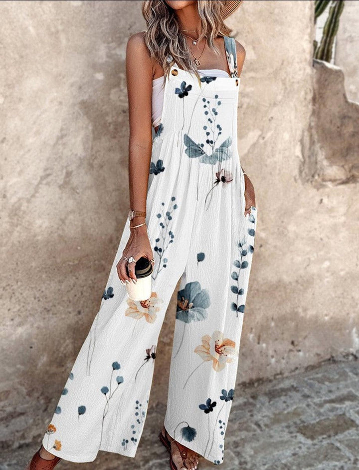 Elegant women's one-piece wide-leg jumpsuit with a vibrant floral pattern and comfortable sleeveless fit.