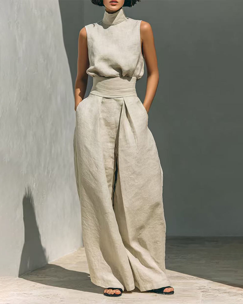 Modern women's sleeveless wide-leg jumpsuit for a smart casual and elegant fashion statement. Perfect summer outfit.