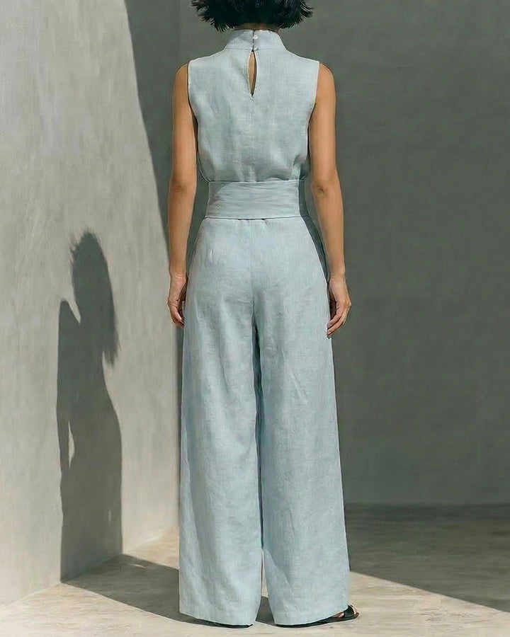 Versatile women's sleeveless jumpsuit with a flowing wide leg, creating a comfortable and chic summer silhouette.