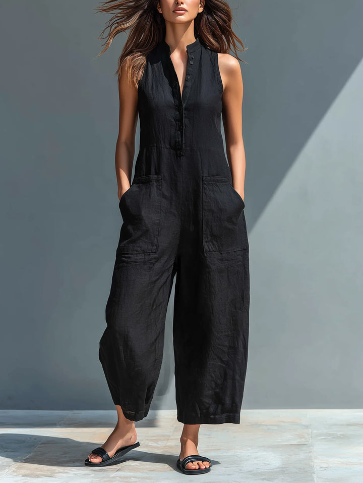 Women's sleeveless wide leg jumpsuit with button front, elegant & comfortable for summer.