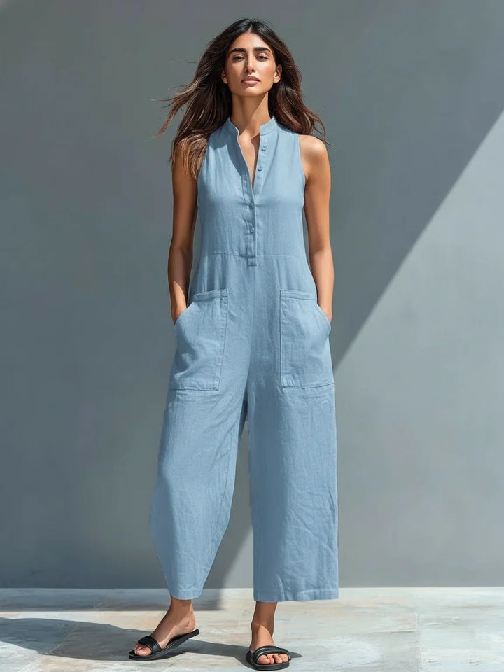 Elegant women's sleeveless wide leg jumpsuit with button front, a perfect casual chic summer outfit.