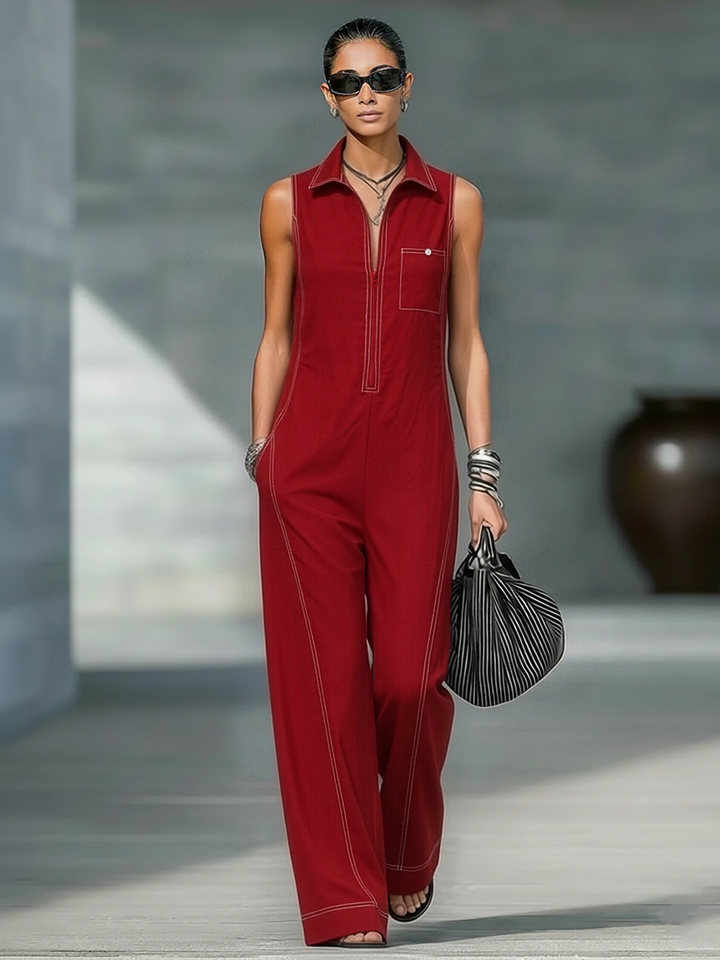 Stylish women's sleeveless wide-leg jumpsuit showcasing prominent contrast stitching, a trendy piece for all seasons.