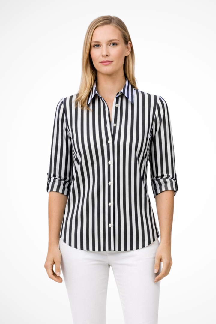 Stylish woman wearing a striped long sleeve blouse, perfect for smart casual outings or everyday fashion.