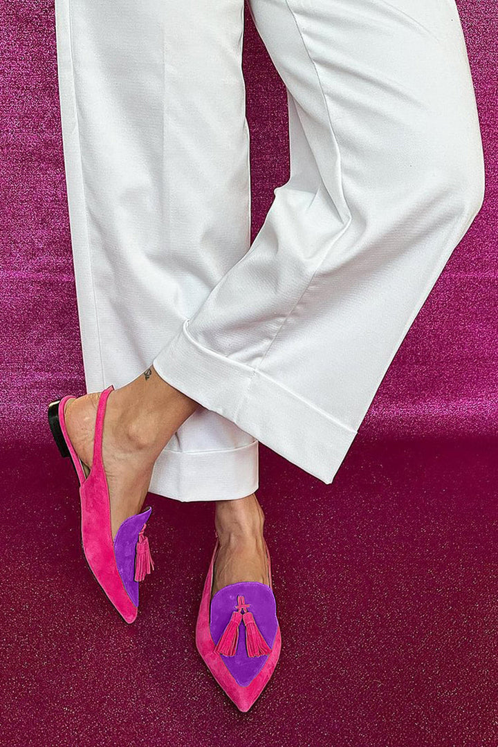 Purple women's slingback loafers with pointed toe & tassel. Versatile flat shoes, perfect for casual or dressy occasions.