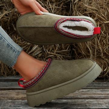 Women's slip-on platform clog slippers for cozy home comfort, stylish indoor loungewear footwear.
