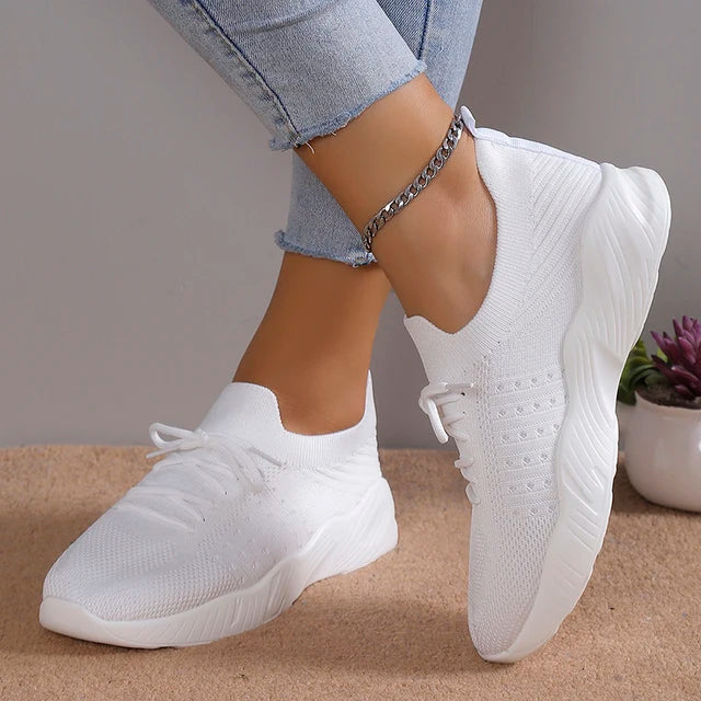 Comfortable women's slip-on sneakers with a flexible design, great for all-day wear.