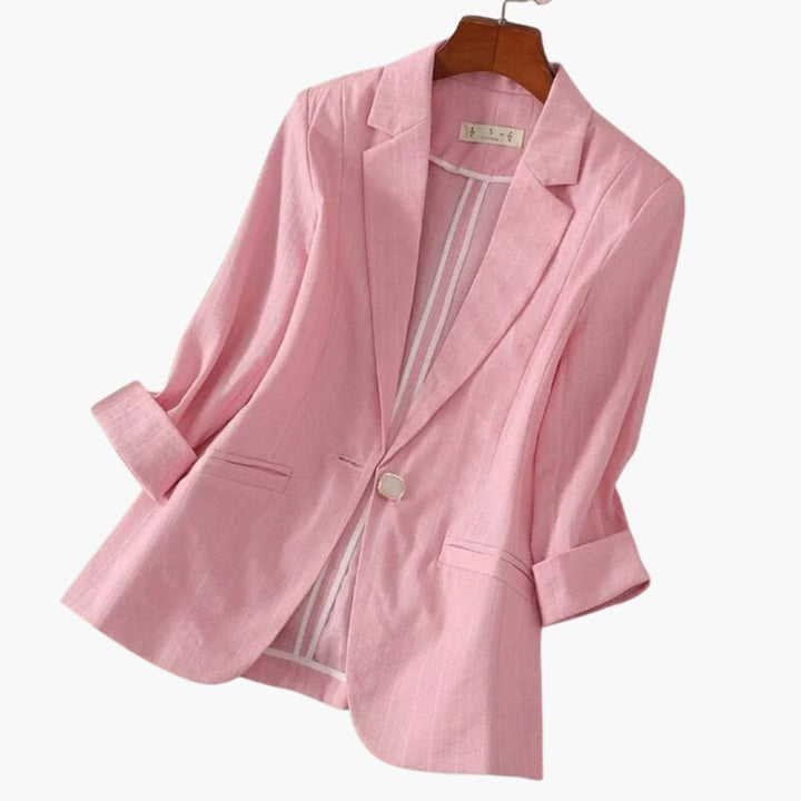 Fashionable women's three-quarter sleeve blazer. Smart casual single-button, notch lapel for comfortable summer styling.