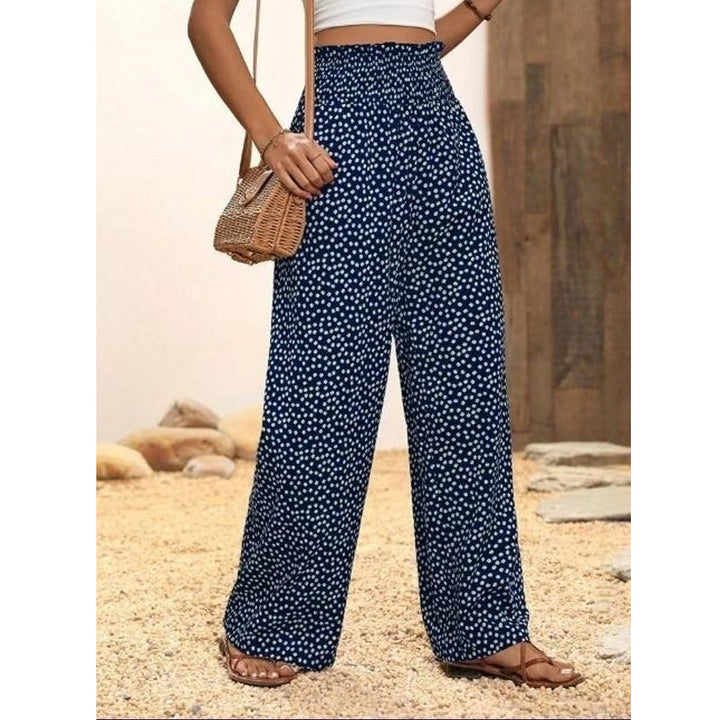 Versatile women's smocked high waist wide leg pants, great for summer fashion.