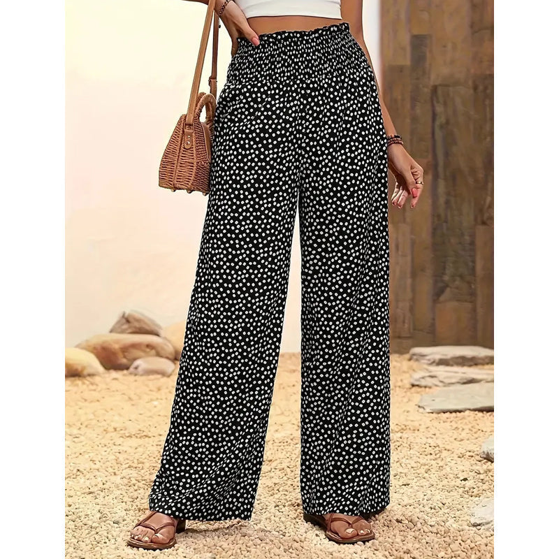 Smocked high waist wide leg trousers for women, offering a comfortable and chic look.