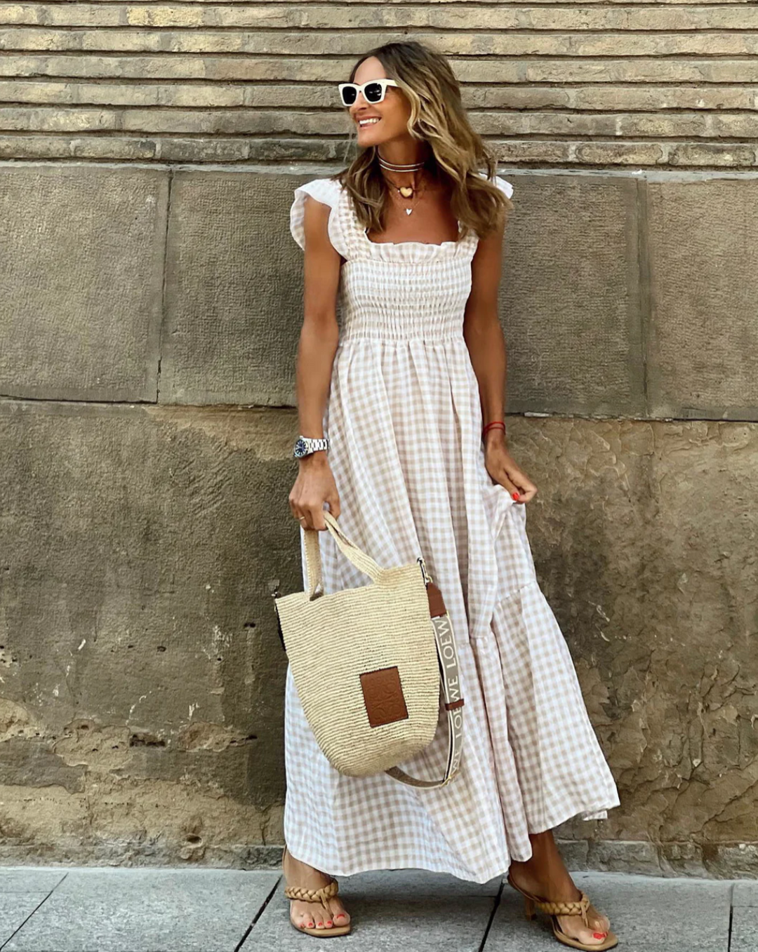 Women's smocked maxi dress, flowing & comfortable, perfect for casual summer elegance.
