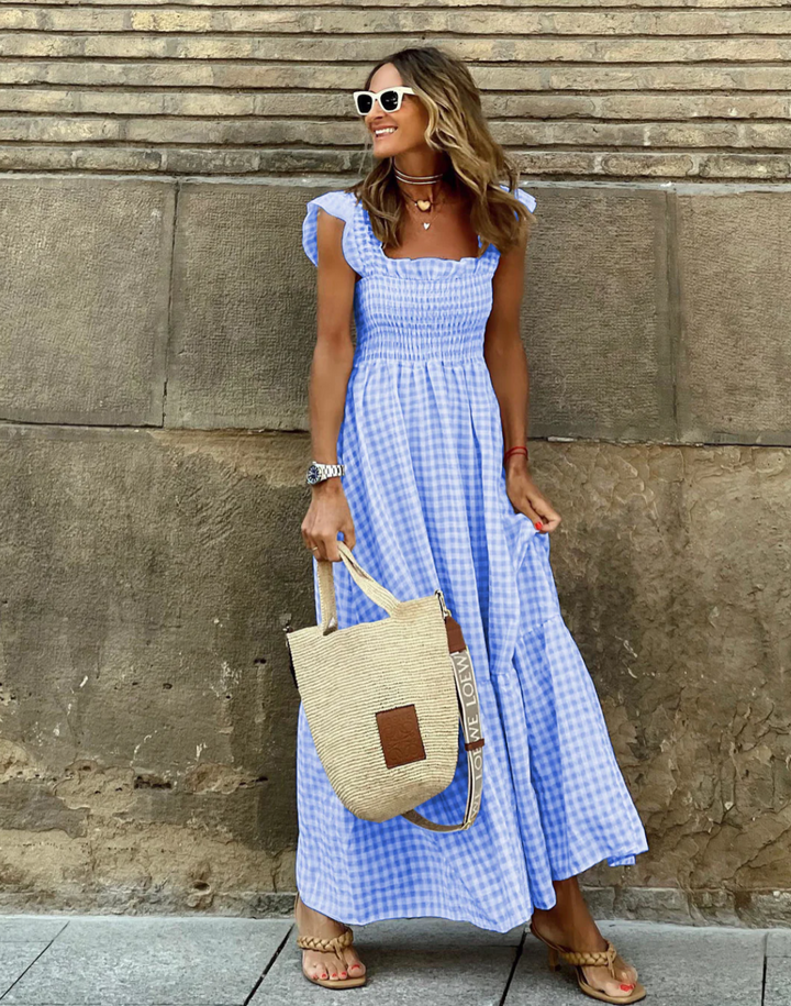 Versatile women's smocked maxi dress, perfect for summer casual outings or elegant event wear.
