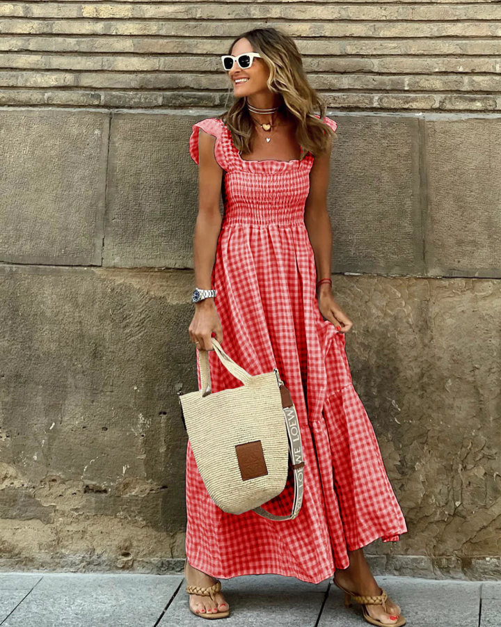 Casual women's summer maxi dress with smocked detail, comfortable and effortlessly elegant.