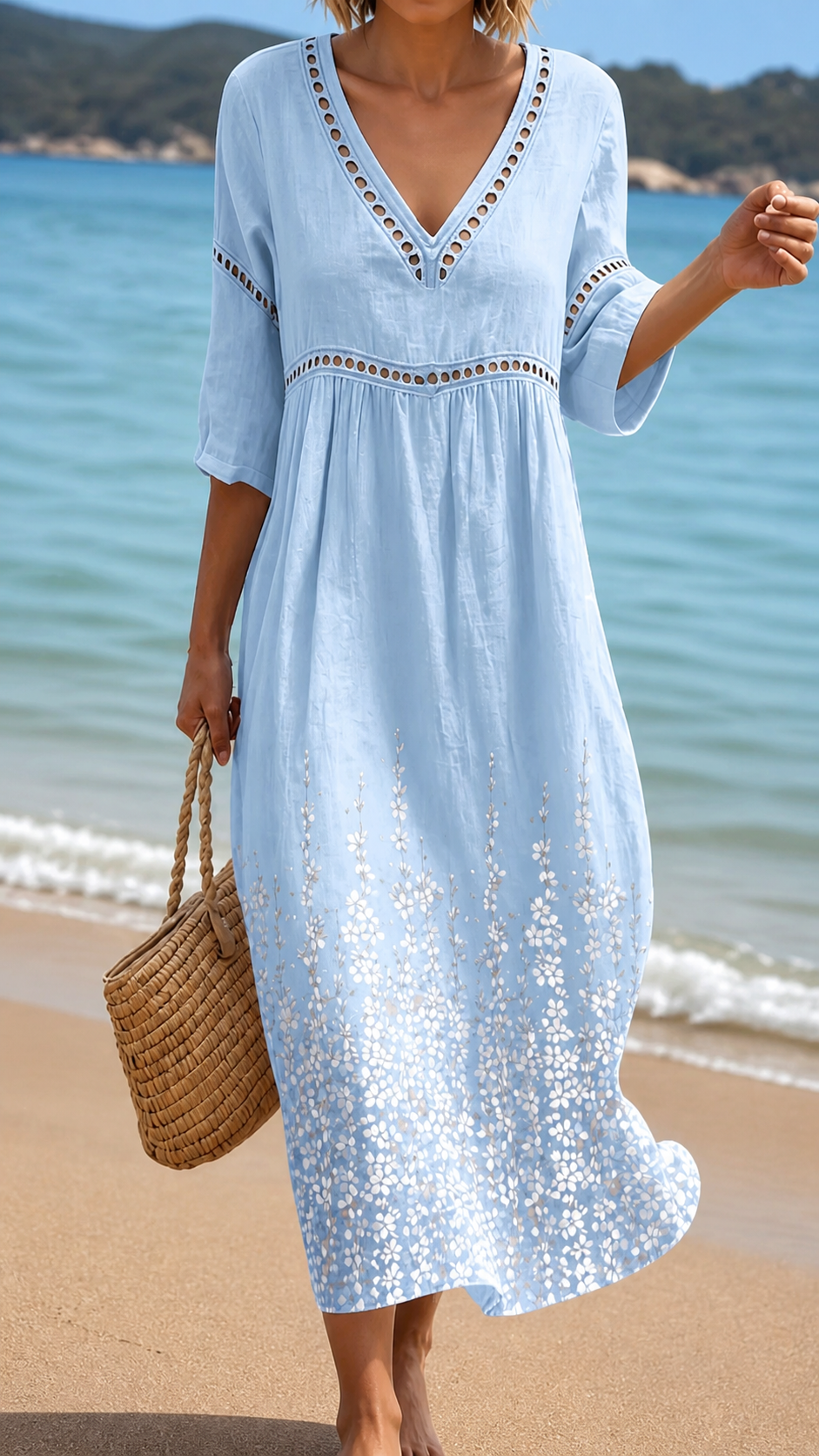 Women's soft blue flowy midi summer dress. Elegant yet casual everyday wear, perfect for parties or versatile styling.