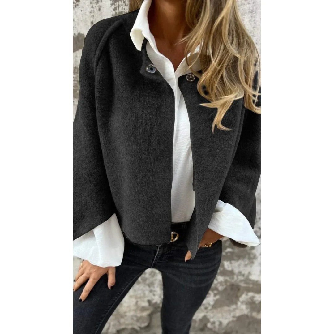 Elegant women's cropped knit cardigan, featuring a soft fabric, wide sleeves, and a stylish stand collar.