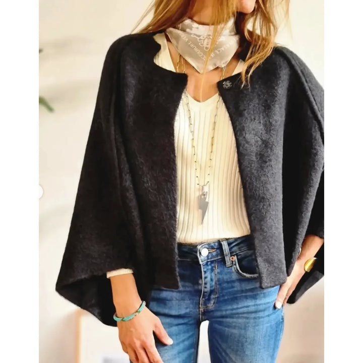 Plush women's cropped cardigan, offering a soft feel, flowing wide sleeves, and an elegant stand collar.
