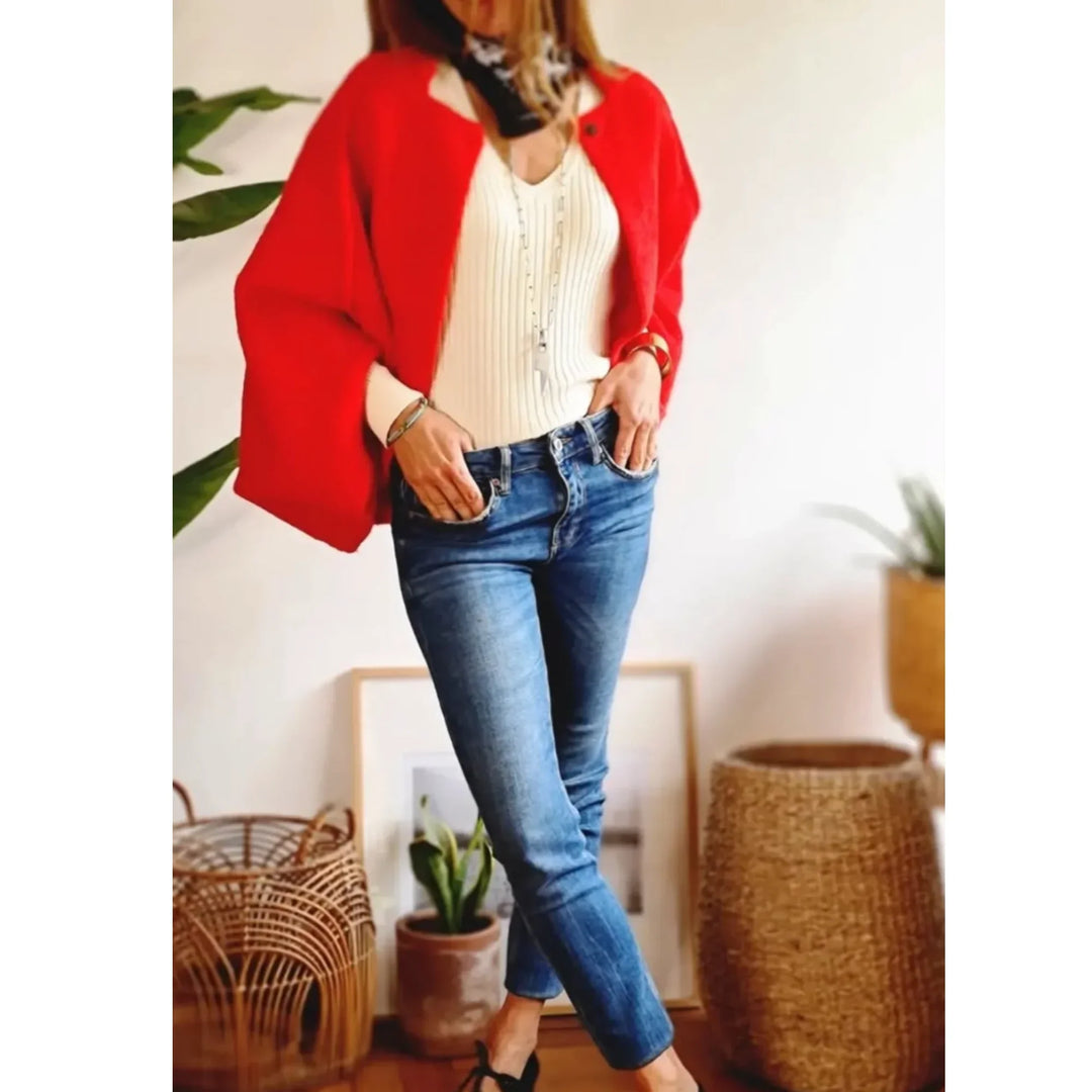 Trendy women's cropped cardigan sweater with stylish wide sleeves and a distinctive stand collar.