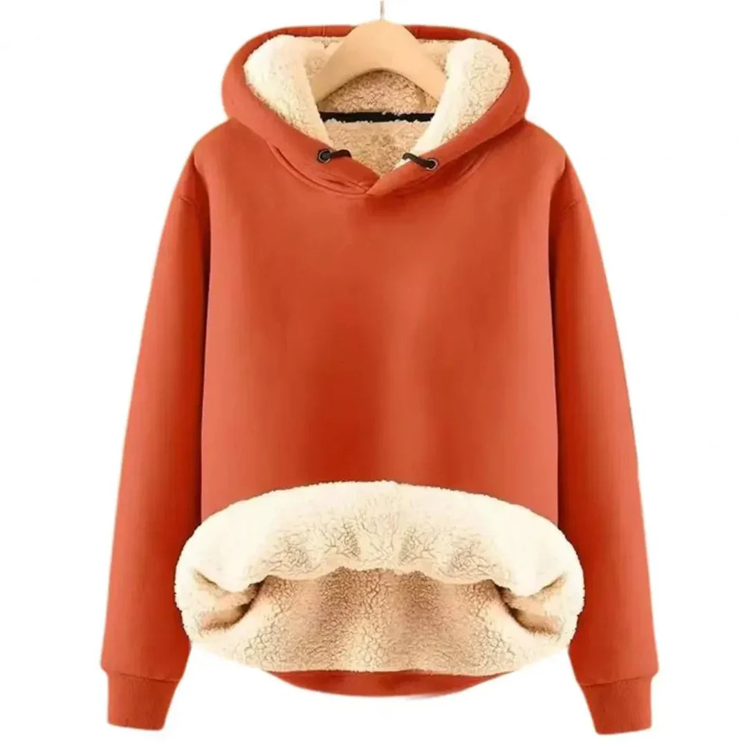 Women's soft fleece-lined hoodie, perfect for cozy comfort in winter.