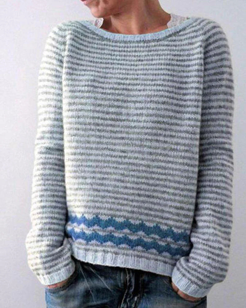 Women's soft gray Nordic comfort sweater with zigzag pattern. Relaxed fit, long sleeve for casual winter fashion.