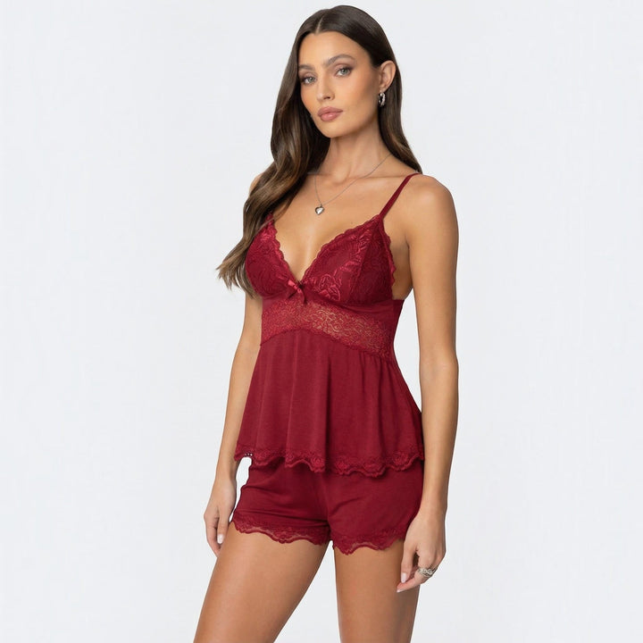 Chic women's lace intimates pajama set with camisole and comfy shorts for soft nightwear.
