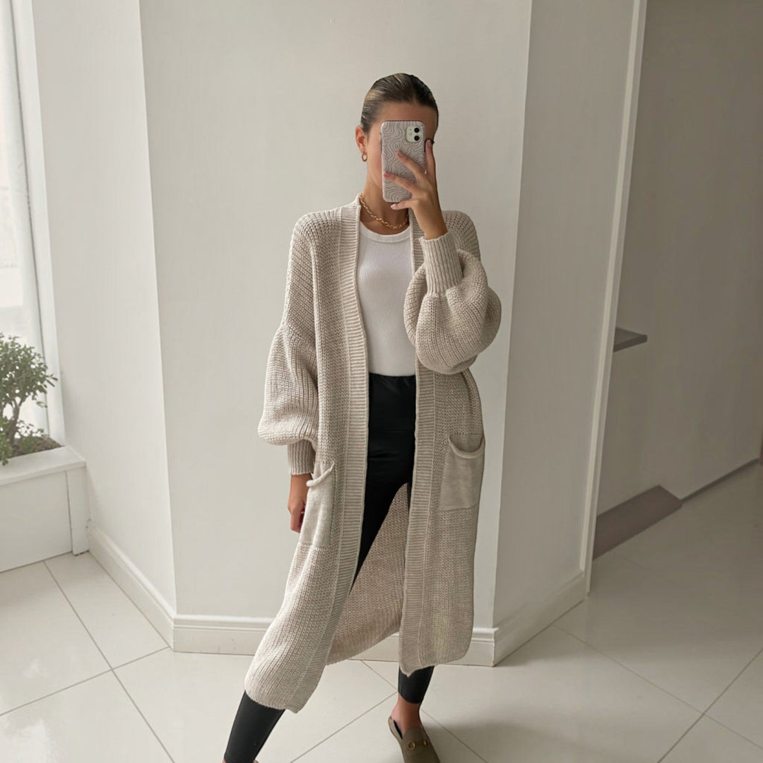 Neutral longline cardigan for women, soft and chic, ideal for versatile layering and effortless everyday style.