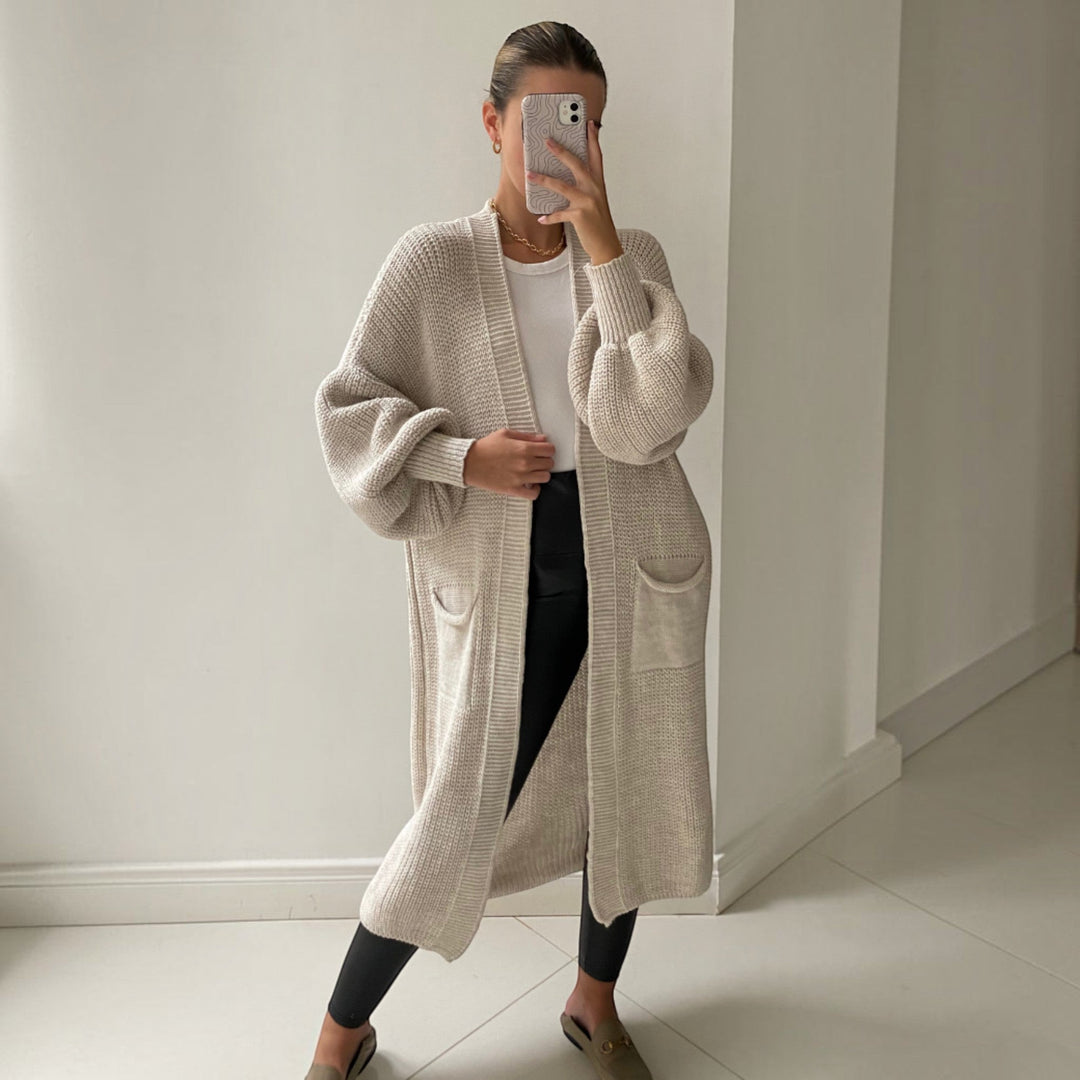 Women's longline soft knit cardigan, an elegant and versatile layering piece for effortless everyday style.
