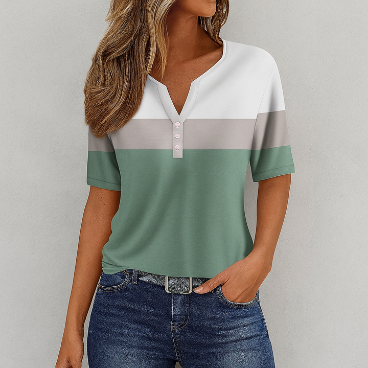 Relaxed fit women's striped V-neck t-shirt. Versatile for casual summer fashion or a comfortable spring outfit.