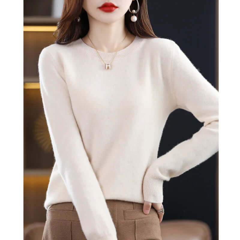 Elegant women's everyday sweater, warm long sleeve pullover for winter comfort.