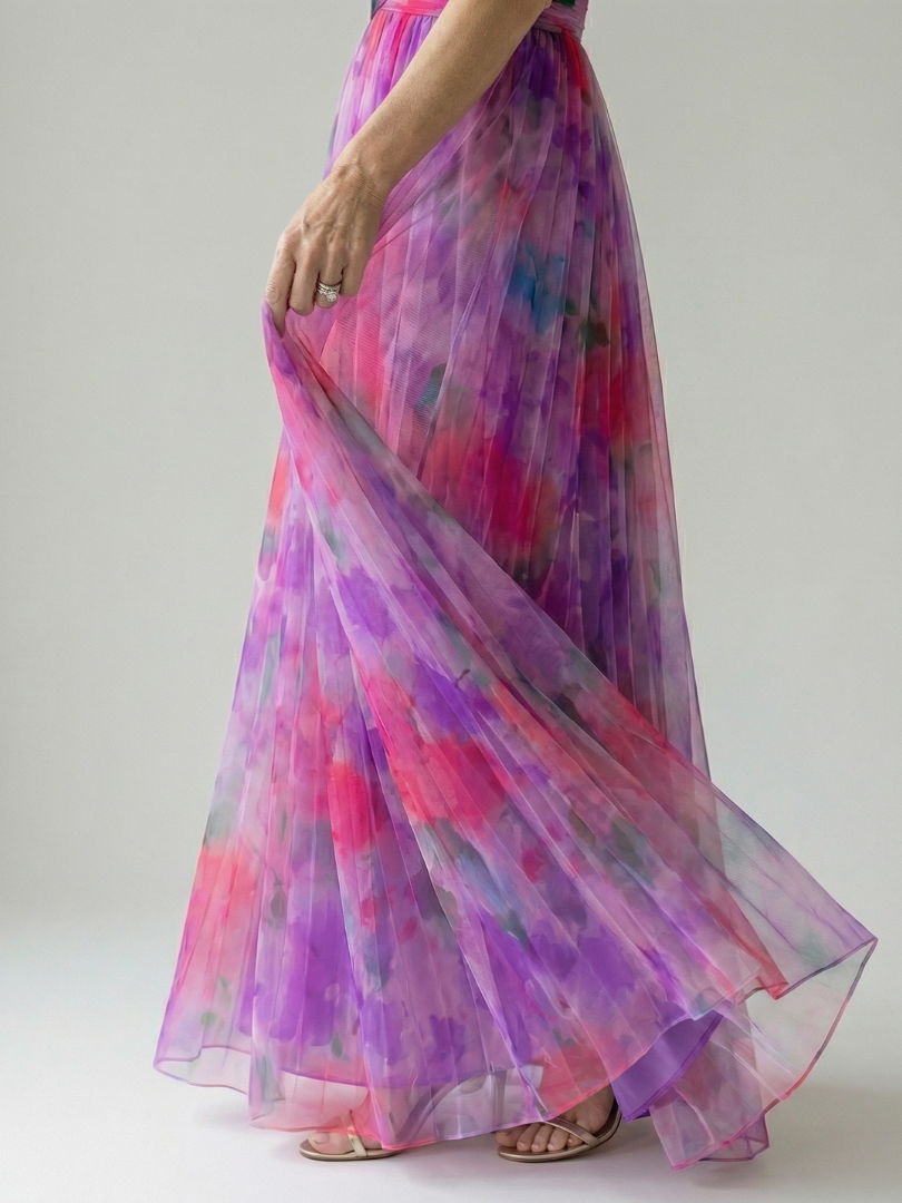 Elegant women's sleeveless wrap maxi dress, vibrant multi-color print, comfortable.