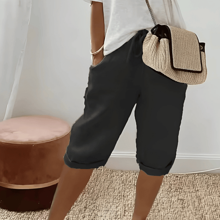 Comfortable women's relaxed fit harem shorts, knee-length, perfect for casual summer fashion & everyday style.