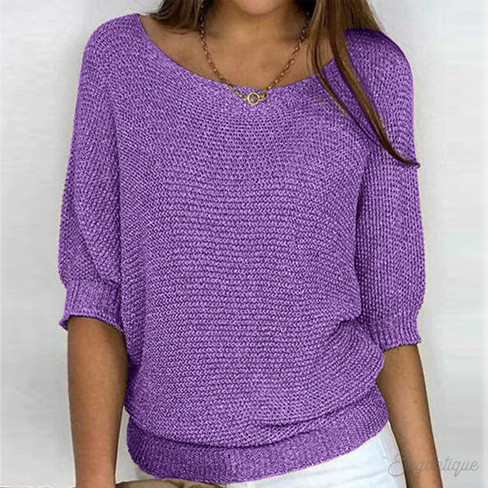 Front view: Women's solid oversize long sleeve crew neck sweater for a relaxed, cozy look.