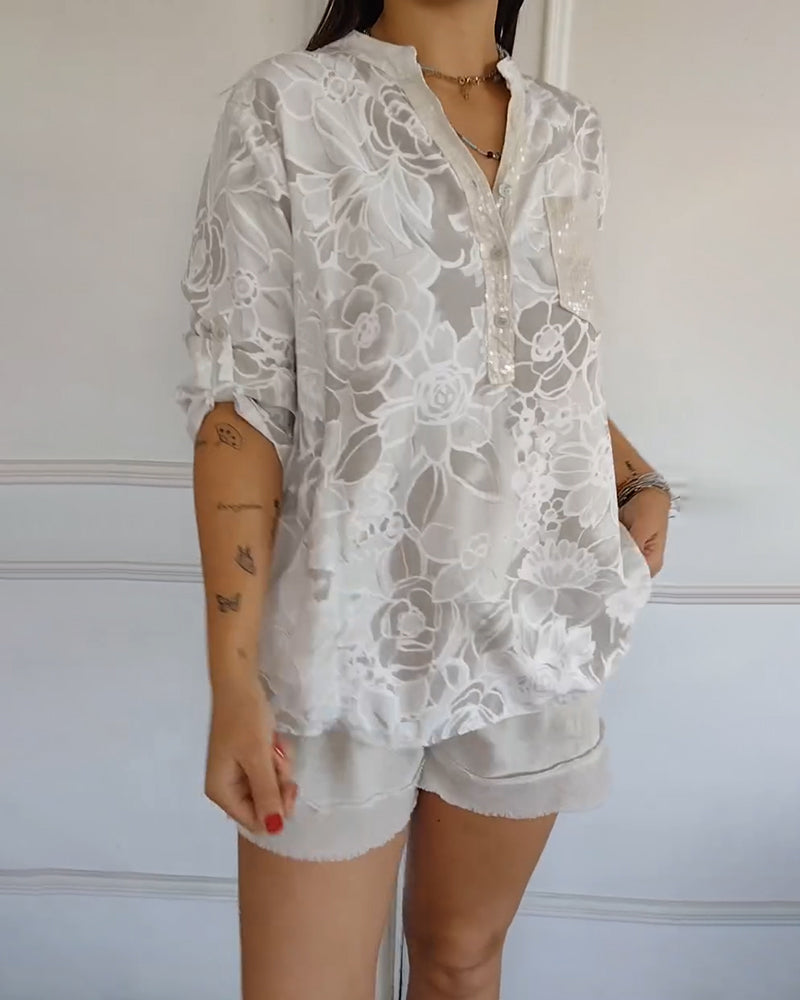 Long-sleeve floral blouse for women, designed for effortless style from day to night.