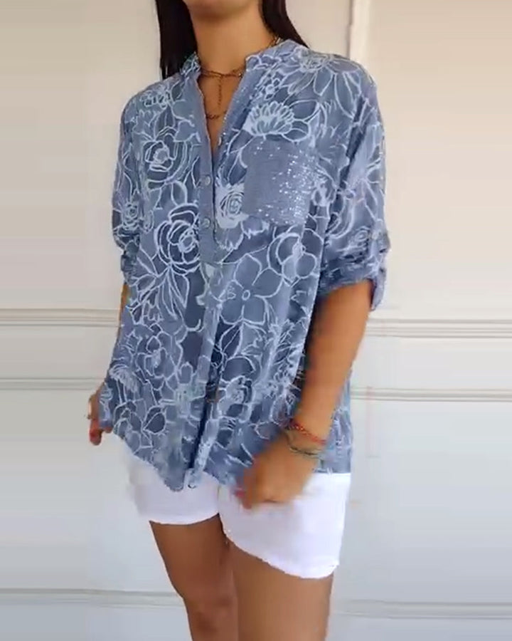 Elegant long-sleeve floral top for women, providing effortless style and day-to-night versatility.